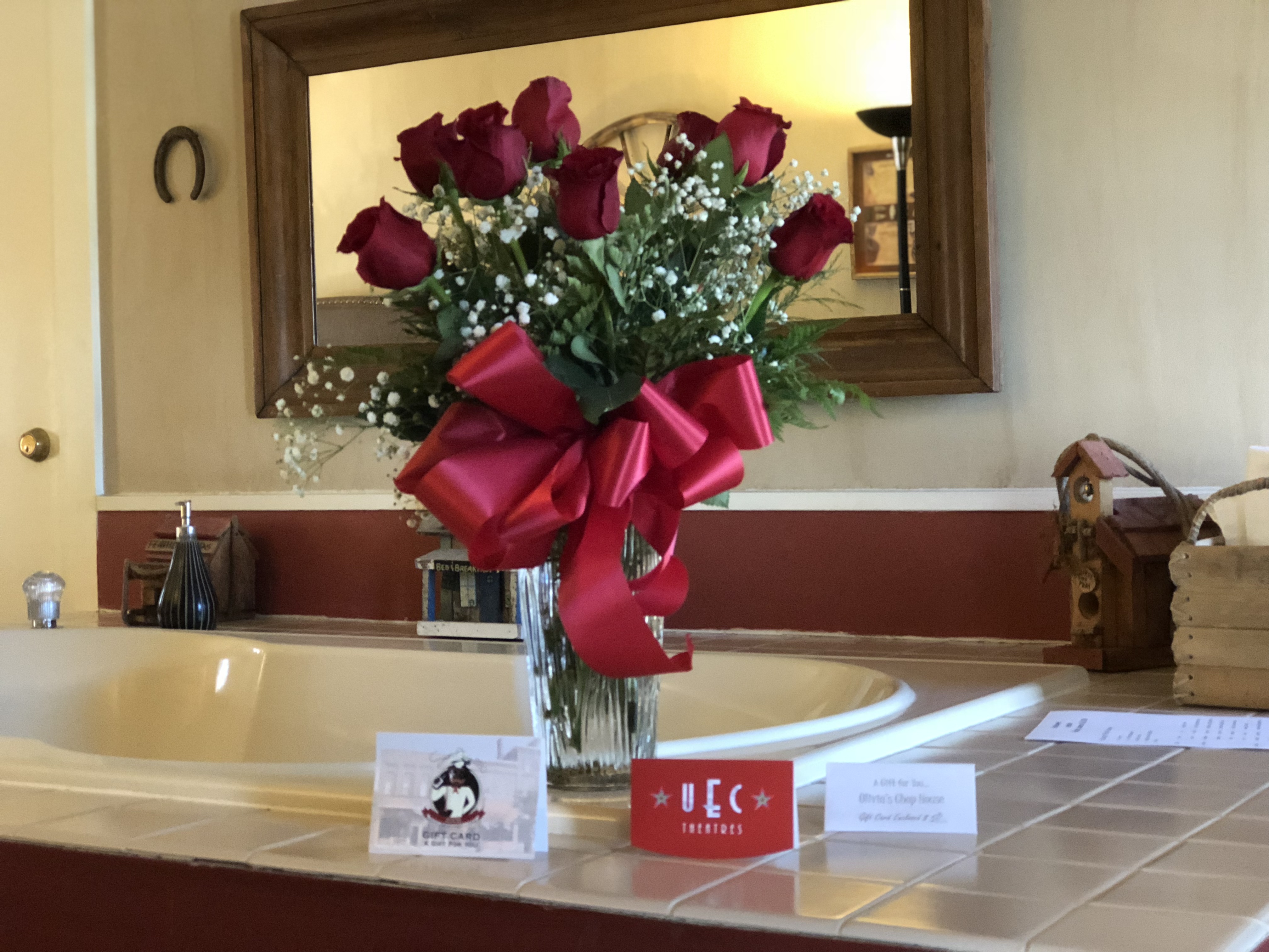 Red roses floral bouquet with gift cards