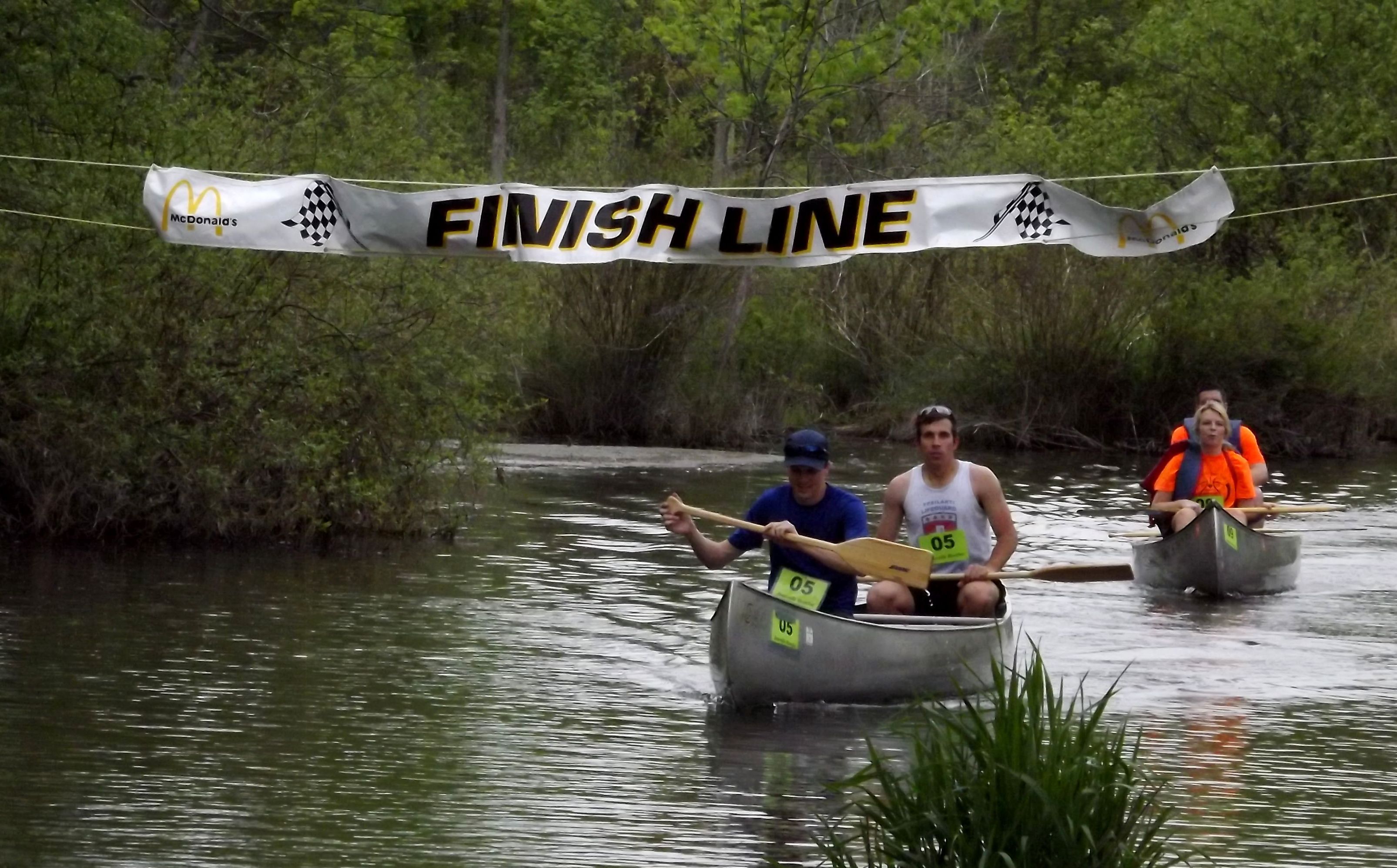 finish line of canoe race on river