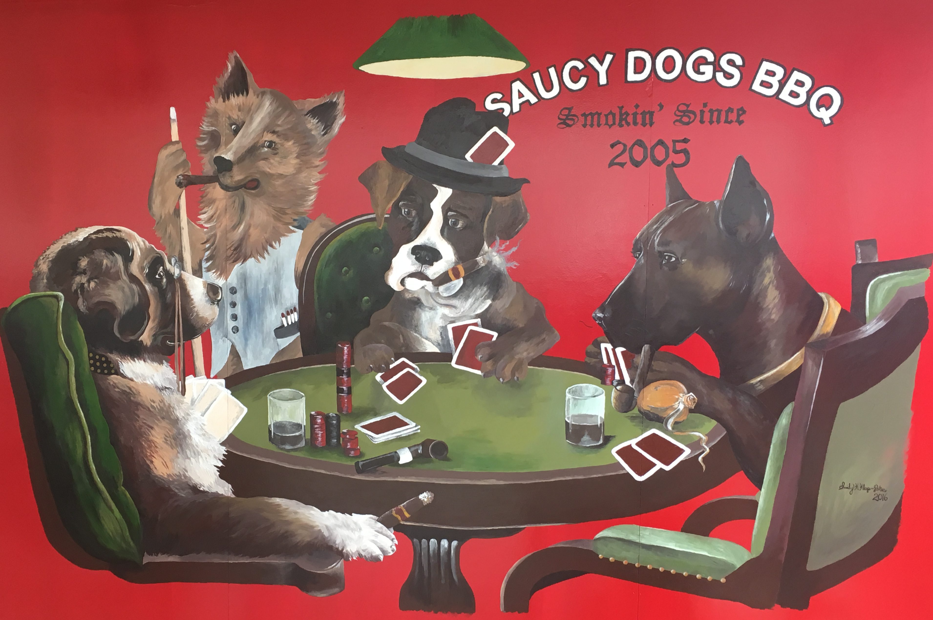 Saucy Dogs Barbeque in Jonesville Michigan. Best BBQ since 2005. Dogs playing cards agree.