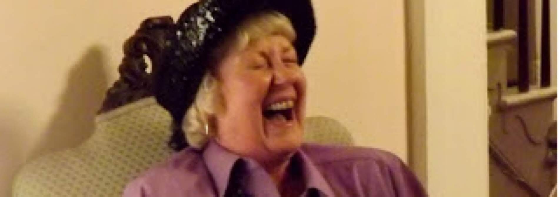 woman laughing big