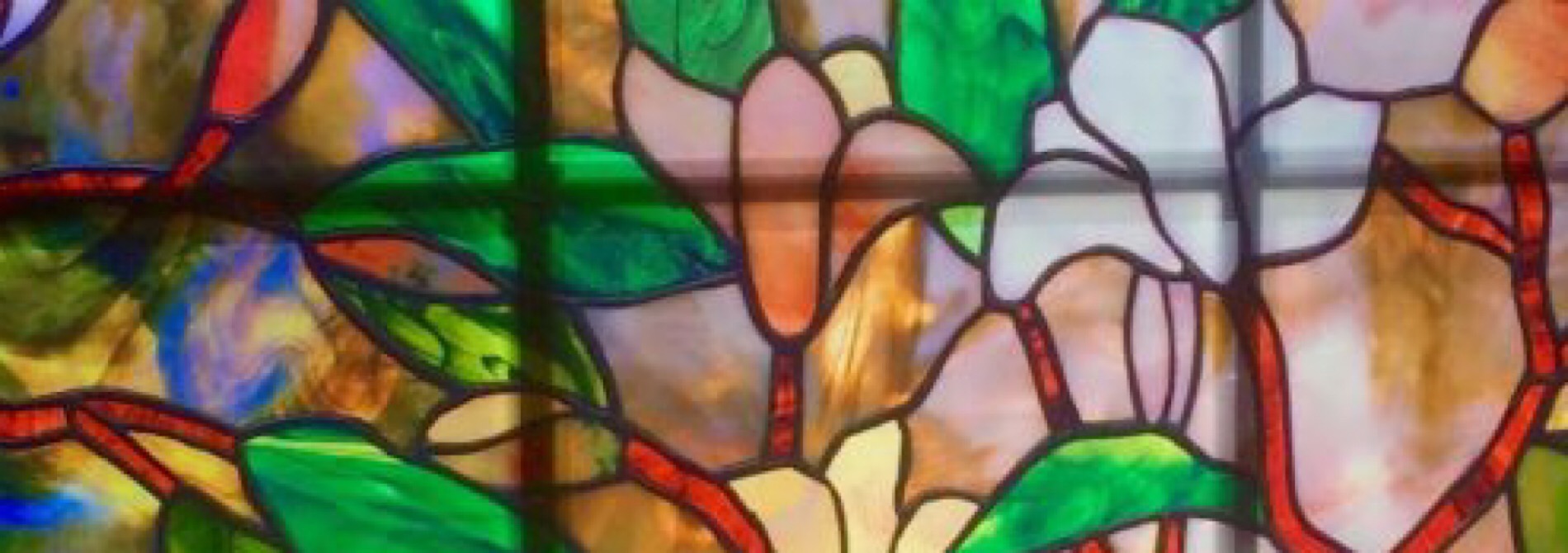 stained glass window green yellow pink red
